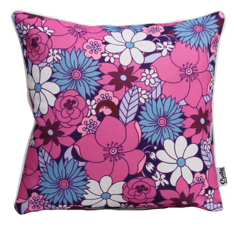 Colourful floral outdoor scatter cushion styled on outdoor seating