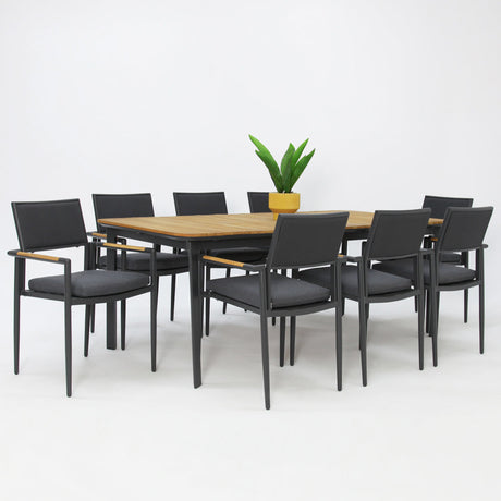 Nine-piece outdoor dining setting with cushioned chairs ready for a large gathering