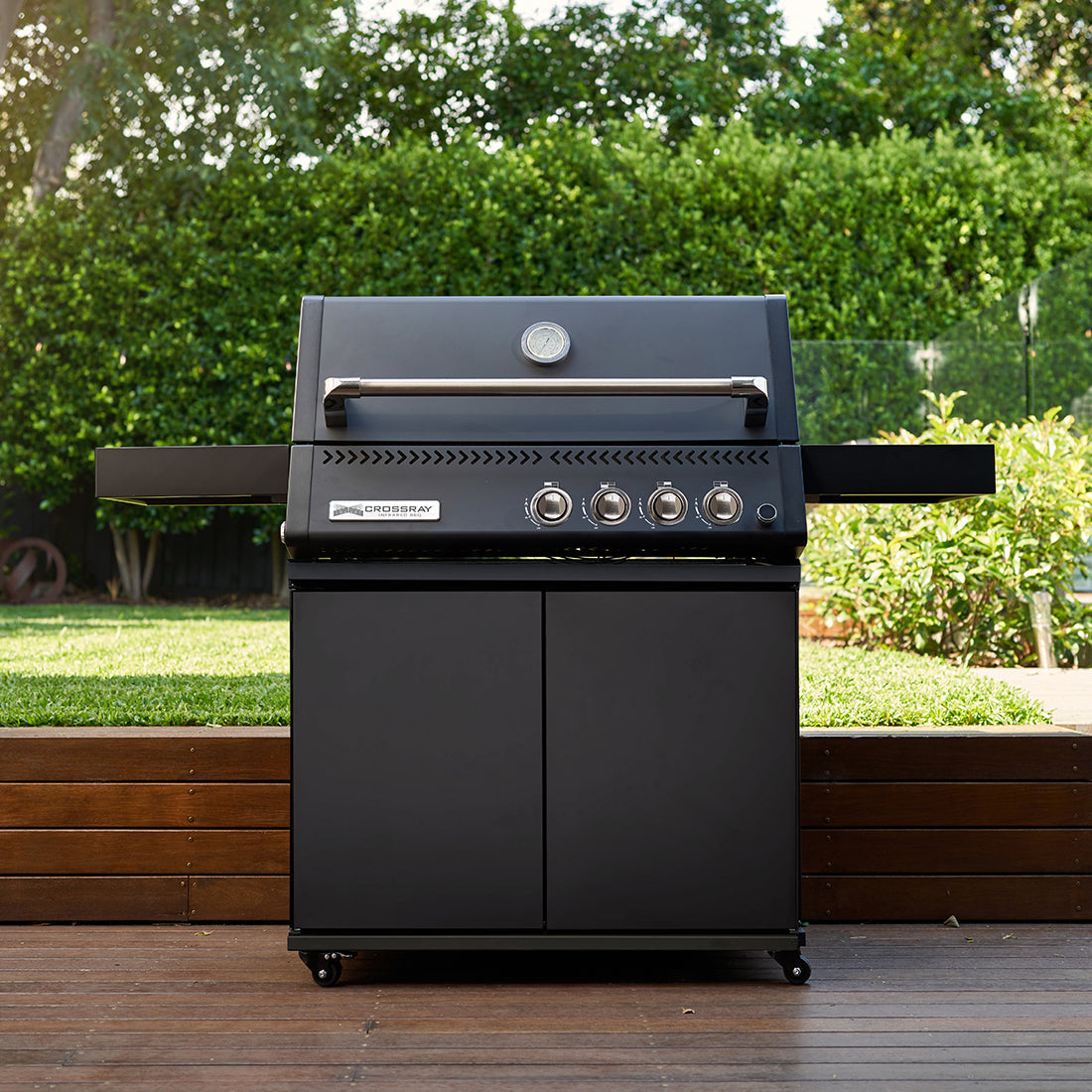 Crossray Xplor four-burner BBQ in an alfresco entertaining area