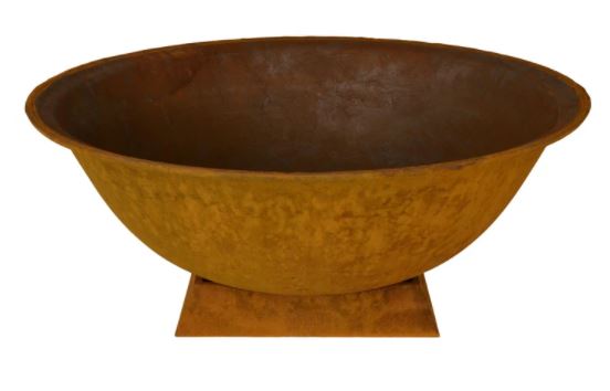 Steel firepit providing warmth for a backyard outdoor area in winter