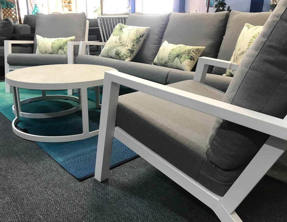 Surfside white aluminium outdoor lounge in a coastal setting