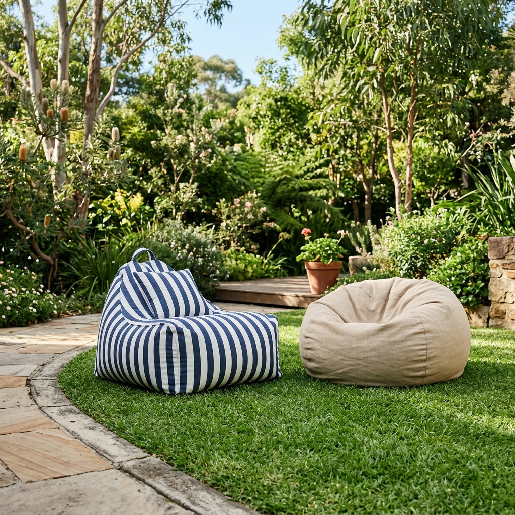 Striped and sand outdoor bean bags on a lawn