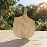 Buschbeck Wooden Pizza Paddle — outdoor setting