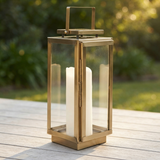 Amalfi Gold Hurricane Lantern Large — outdoor setting