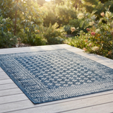 Pearl Blue Floral Polypropylene - Outdoor Rug — outdoor setting